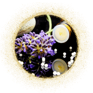 close-up image of lavender and homeopathic remedies spilled over a reflective table surface
