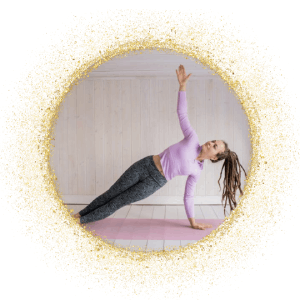 young woman doing side plank position on a pink yoga, pilates mat
